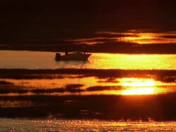 Boat in Bay at Sunset â€“ HD Stock Footage
