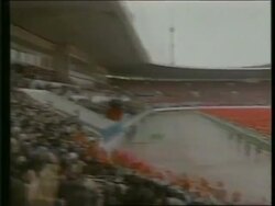 April 16, 1992 FILM MONTAGE MS Cheering crowd/ PAN WS Celebration in stadium for Kim Il-Sung's 80th birthday/ MS Kim Il-Sung waving to crowd/ WS Fireworks/ WS Crowd/ North Korea/ AUDIO Stock Footage