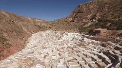 Maras salt farms (Salinas de Maras), Peru drone view Stock Footage