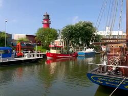 WS View of boats on old harbor, North Sea, North Frisia / Busum, Schleswig Holstein, Germany Stock Footage