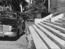 Buildings, hospitals, schools, harbours and an airport in Martinique, Antilles, 1950s Stock Footage
