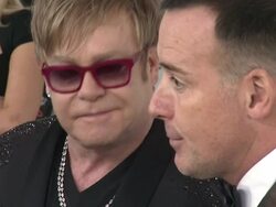 Elton John and David Furnish at Elton John Aids Foundation Celebrates 20th Annual Academy Awards Viewing Party on 2/26/12 in Hollywood, CA. (Footage by WireImage Video/Getty Images Entertainment Video) Stock Footage