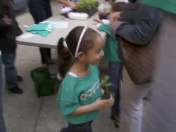 Kids at American Heart Association Teaching Gardens Planting in Harlem Stock Footage