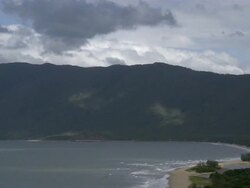 WS View of beach, ocean, mountains and rolling coastline / Great Barrier Reef, Australia Stock Footage