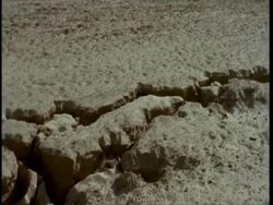 MCU Pan left along fault line in desert, Gujarat, India Stock Footage