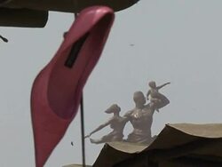 CLEAN:Senegal's scantily clad statue roils independence fete News Clip