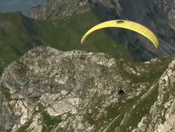 MS TS Shot of paraglider at Mount Nebelhorn / Oberstdorf, Bavaria, Germany Stock Footage