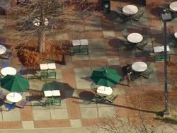 MS AERIAL Shot of people roaming through restaurant at clemson university / South Carolina, United States Stock Footage