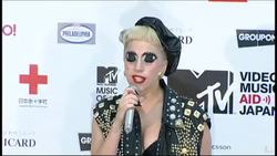 Lady Gaga keeps her eyes shut during press conference News Clip