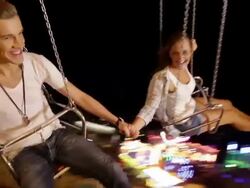 Young people on Chairoplane Stock Footage