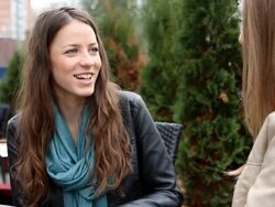 Two young women whispering Stock Footage