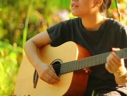Asian woman with guitar Stock Footage