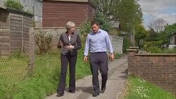 Sean Mercer and Theresa May walking News Clip