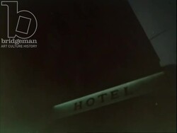 Young lady writes in her journal before going to sleep. c.1960 Stock Footage