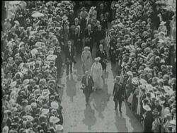 British King George V and Queen Mary attend a horse race at Epsom Race Course where suffragette Emily Wilding Davidson runs onto the race track is run over by a horse. News Clip