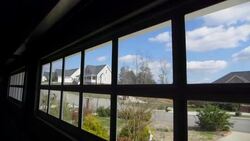 Time Lapse of Clouds and Home Under Blue Sky with White Clouds Stock Footage