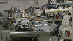 Robots weld auto parts in a factory. Stock Footage