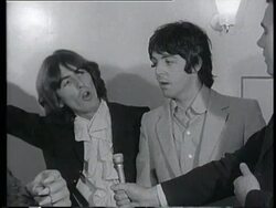Interview with The Beatles and cartoon character Stock Footage