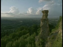 WA high angle, Devils Chimney Limestone Tower, Gloucestershire looking across to Cheltenham town Stock Footage
