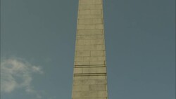 Abraham Lincoln statue flanked by bronze civil war period statues of soldiers in front of obelisk Stock Footage