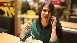 Young woman using smart phone Stock Footage