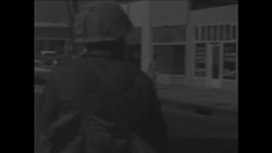 CAN587 POLICE AND FIREMEN AT WORK DURING WATTS RIOTS News Clip