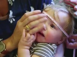 CU Shot of doctor measuring baby's head / Santa Fe, New Mexico, United States Stock Footage