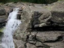 CU PAN Shot of Hoopii Falls / Kapaa, Kauai, Hawaii, United States Stock Footage
