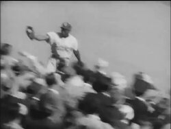 B/W 1955 high angle Brooklyn Dodger Sandy Amoros catching + throwing ball near audience / World Series Stock Footage
