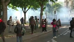 CLEAN : Paris May Day rally dispersed with tear gas News Clip