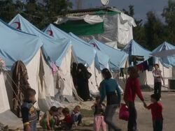 MS tents and refugees at Turkish refugee camp for Syrian refugees Stock Footage