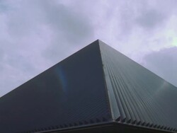 PAN View of blue glass pyramid shaped arena, / Long Beach, California, USA Stock Footage