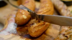 Grilled sausage for dinner Stock Footage