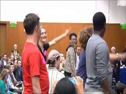 A University of California committee has voted to freeze undergraduate tuition this fall.  Several dozen students and workers dressed as zombies briefly disrupted the committee meeting on Wednesday when they started chanting and dancing to protest rising tuition. News Clip