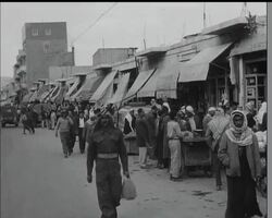 HUSSEIN FETED BY ARMY News Clip