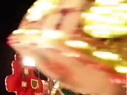 CU Shot of People enjoying amusement ride at funfair, flying bobs / Cologne, Germany Stock Footage