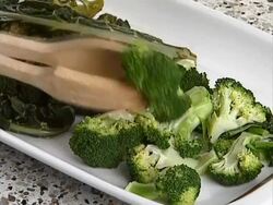 Cooked broccoli on plate Stock Footage