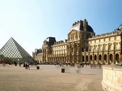 Time-lapse of Louvre Museum on a sunny afternoon in Paris, France Stock Footage
