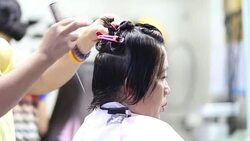 Beautician barber woman's hair Stock Footage