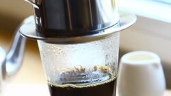 make coffee dripping in Vietnamese style Stock Footage