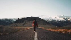 Man  walking on the road Stock Footage