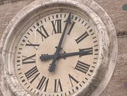 The broken minute hand of an analog clock with Roman numerals moves irregularly. Stock Footage