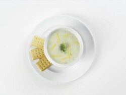 CU Round white plate with potato soup and crackers / Omaha, Nebraska, United States Stock Footage