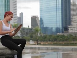 beautiful fitness asian woman with tablet Stock Footage