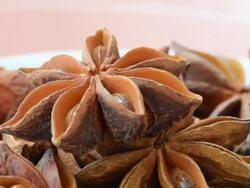 Close up of rotating star anise Stock Footage
