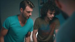 Guys playing tabletop soccer in apartment Stock Footage