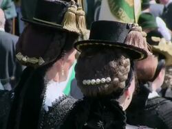 CU Pilgrimage of societies for traditional costumes at abbey Maria Eck near Siegsdorf, Chiemgauer Alps / Siegsdorf, Bavaria, Germany Stock Footage