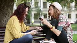 Leisure time with cell phone and tablet Stock Footage