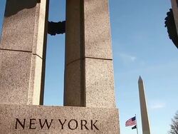 Tilting shot of New York pillar at the World War II Memorial in Washington DC Stock Footage