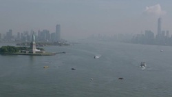 'WS AERIAL View of Statue of liberty with Ship / New York City, United States' Stock Footage